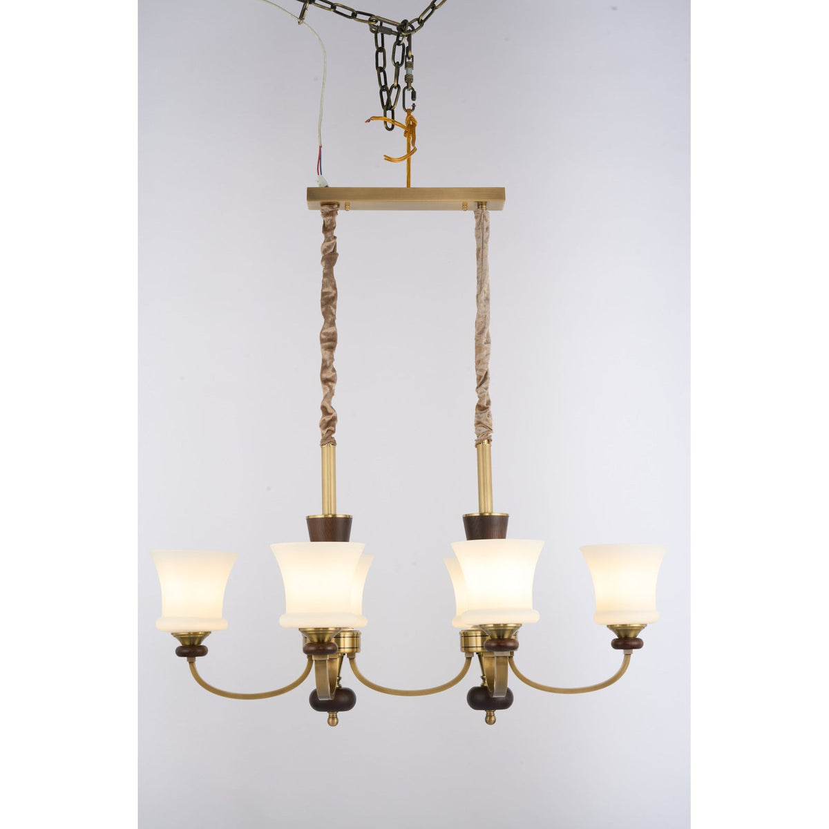 
Caldrienne six-light linear chandelier front lit real product view