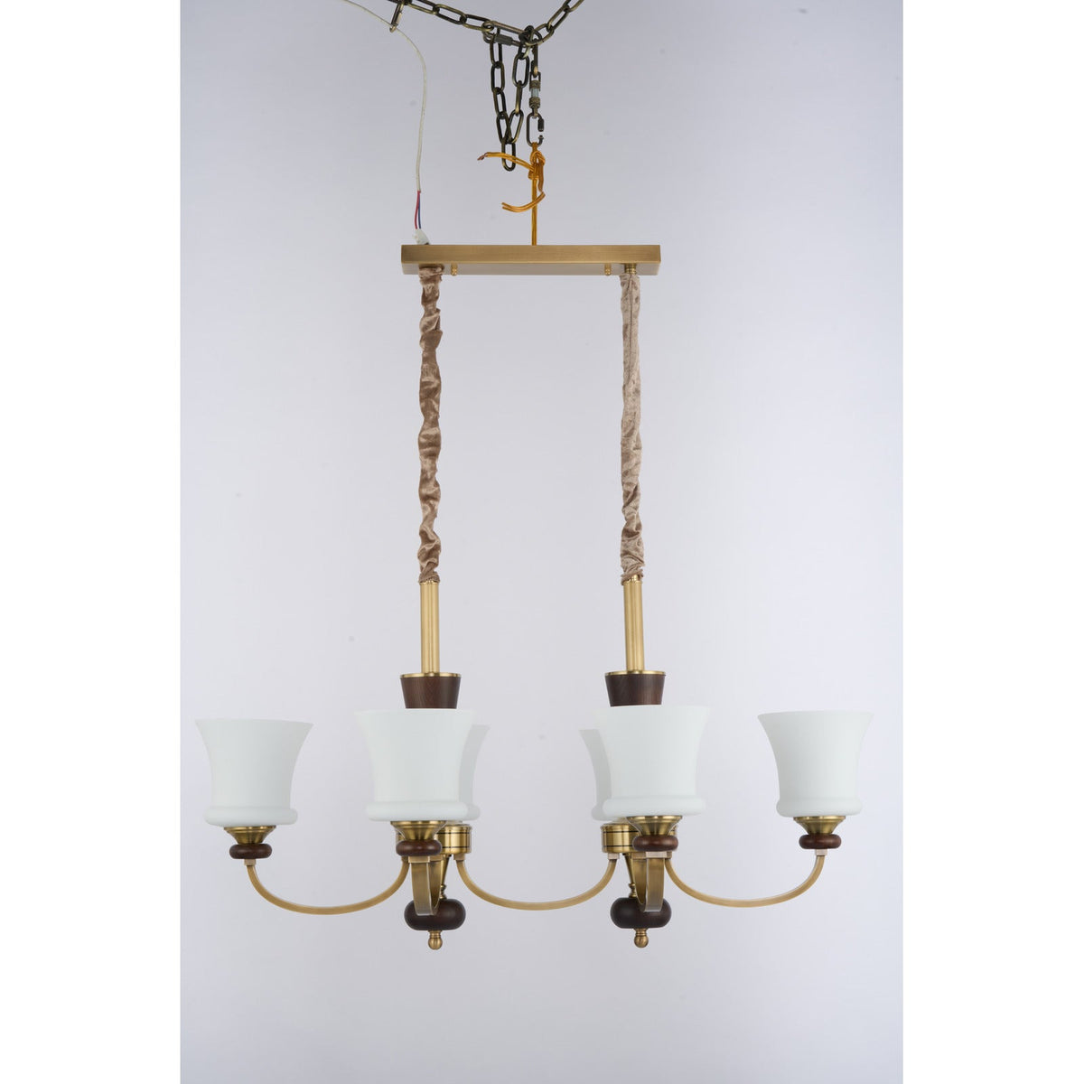 
Caldrienne Opal Glass and Ash Wood Linear Chandelier