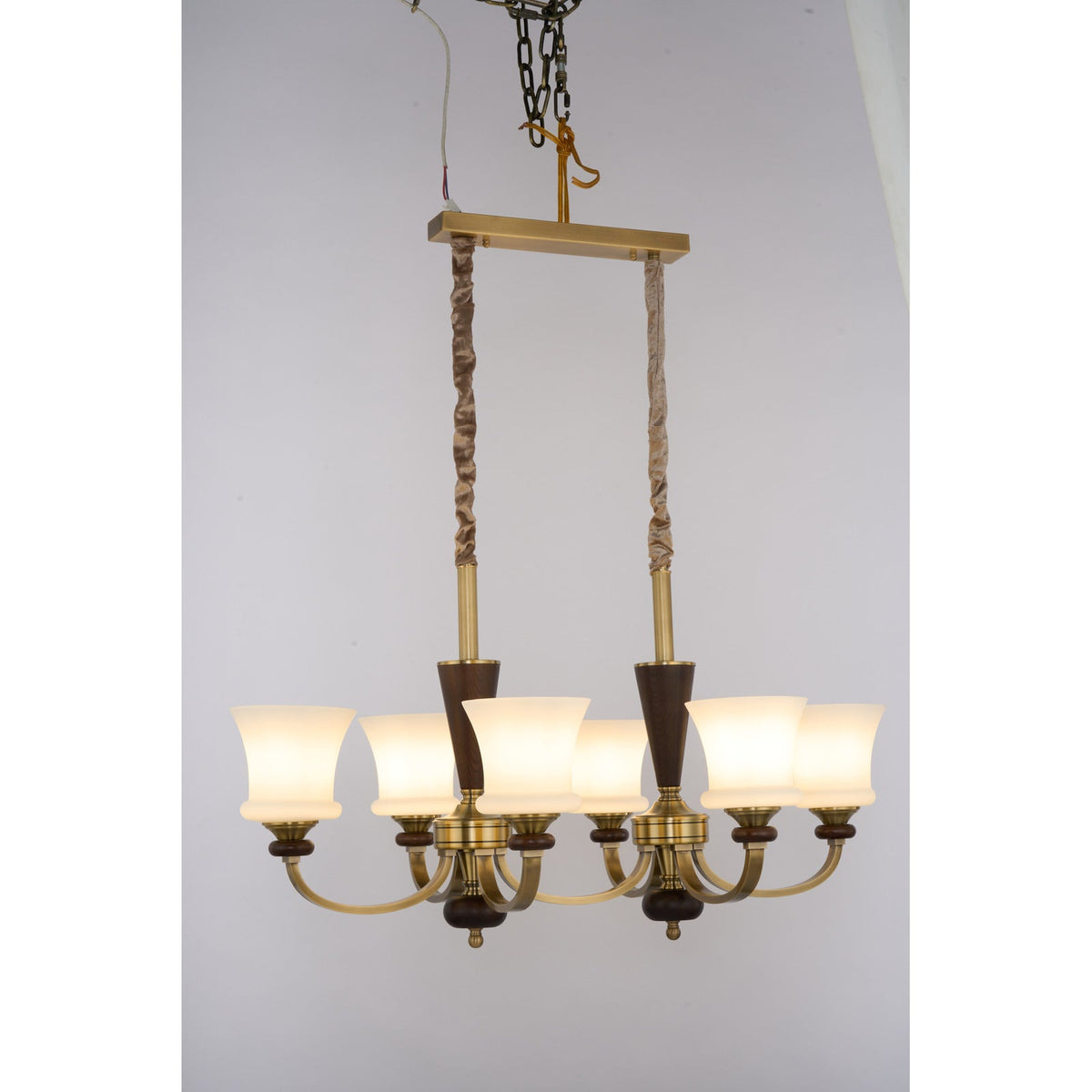
Caldrienne Opal Glass and Ash Wood Linear Chandelier
