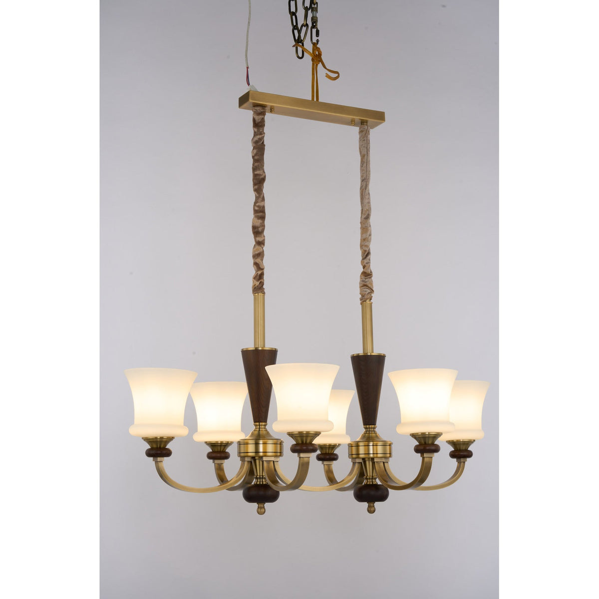 
Caldrienne Opal Glass and Ash Wood Linear Chandelier
