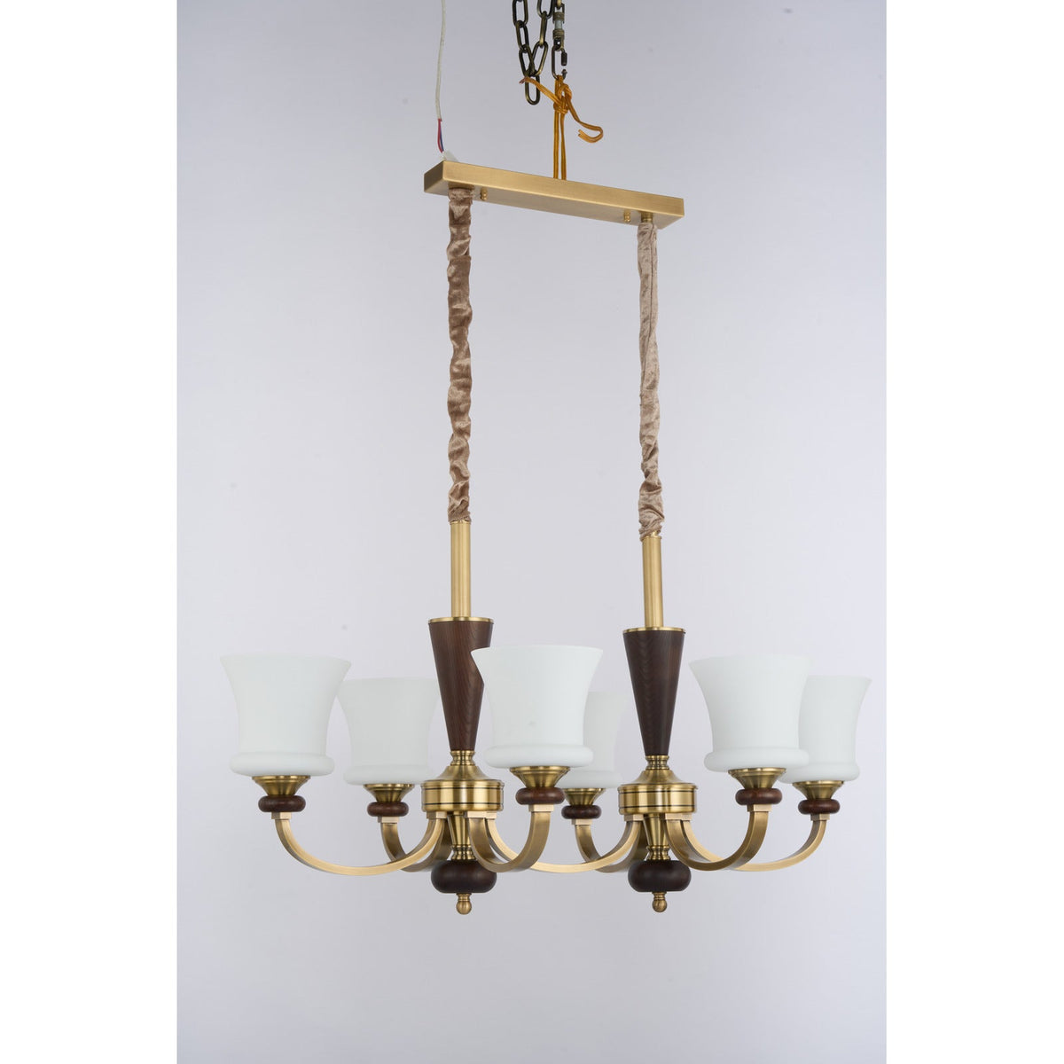 
Caldrienne Opal Glass and Ash Wood Linear Chandelier